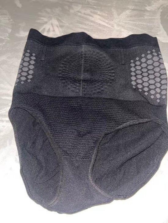 Seamless tummy control underwear styled under fitted clothing